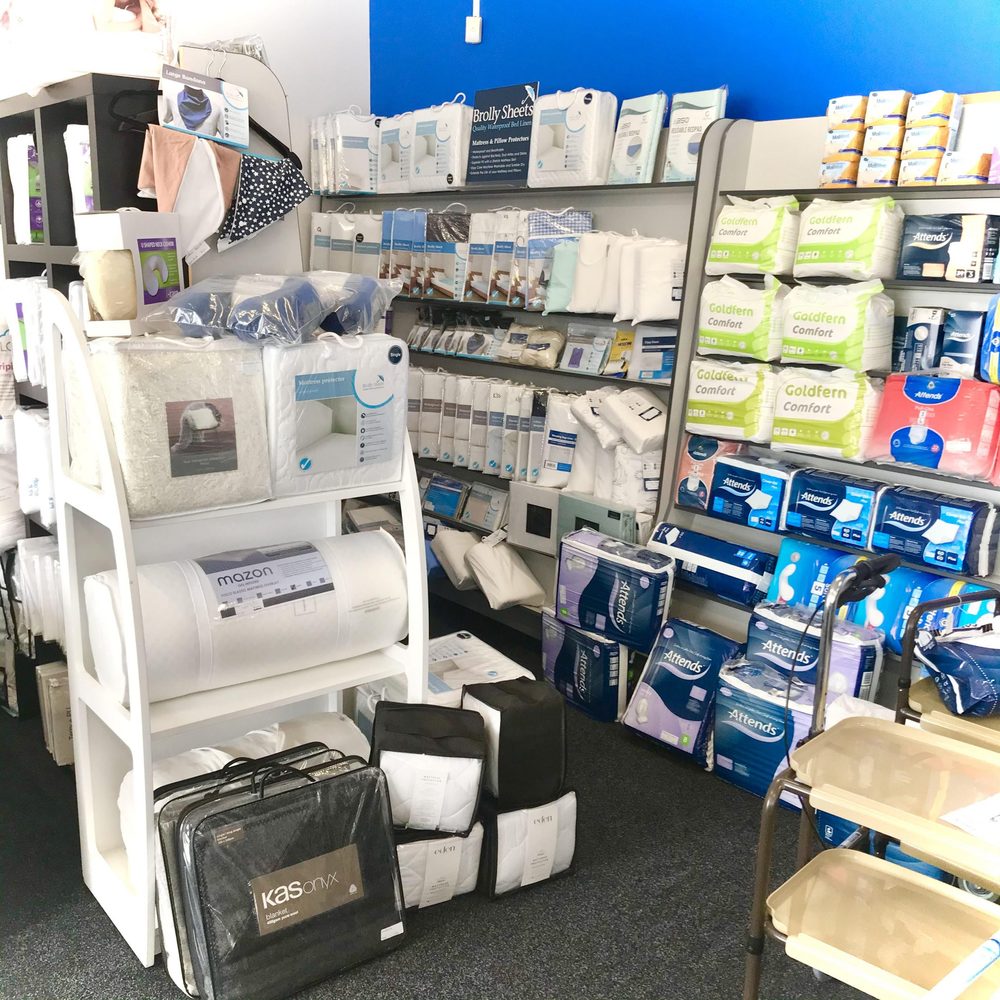 Bedding and daily living products on shelves