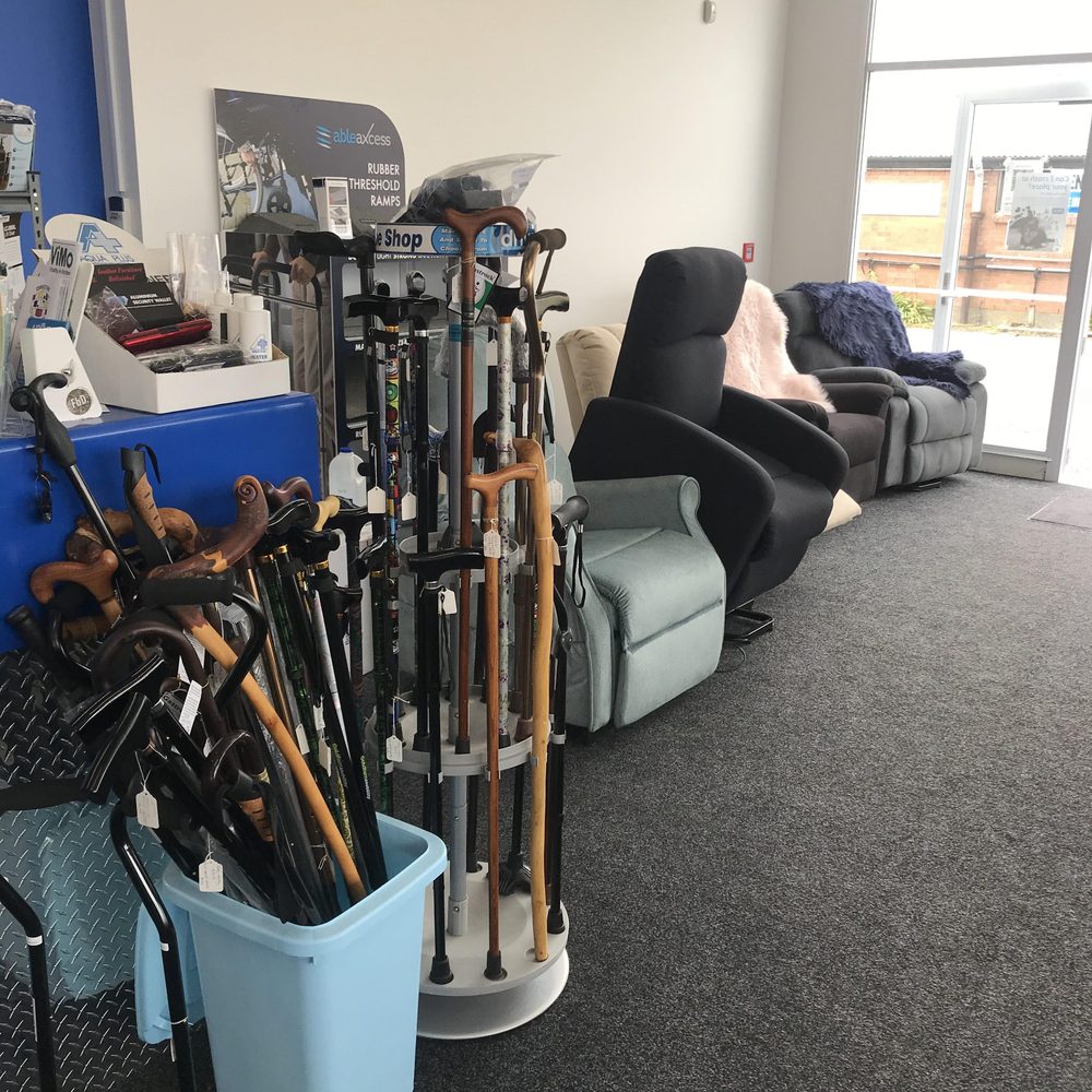 Walking sticks and lift chairs in the showroom